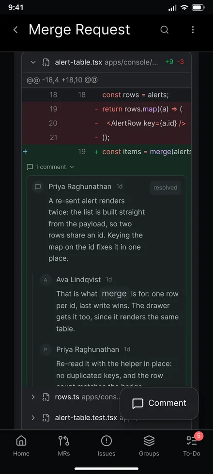 Code diff in GitAlchemy with removed and added lines and a resolved comment